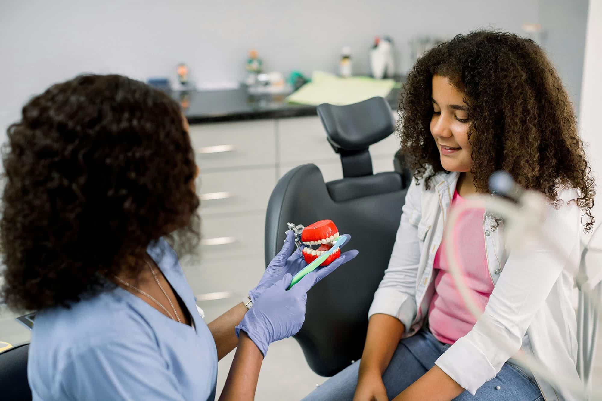 A smiling toddler experiencing stress-free pediatric dental services at Sunset Children's Dentistry