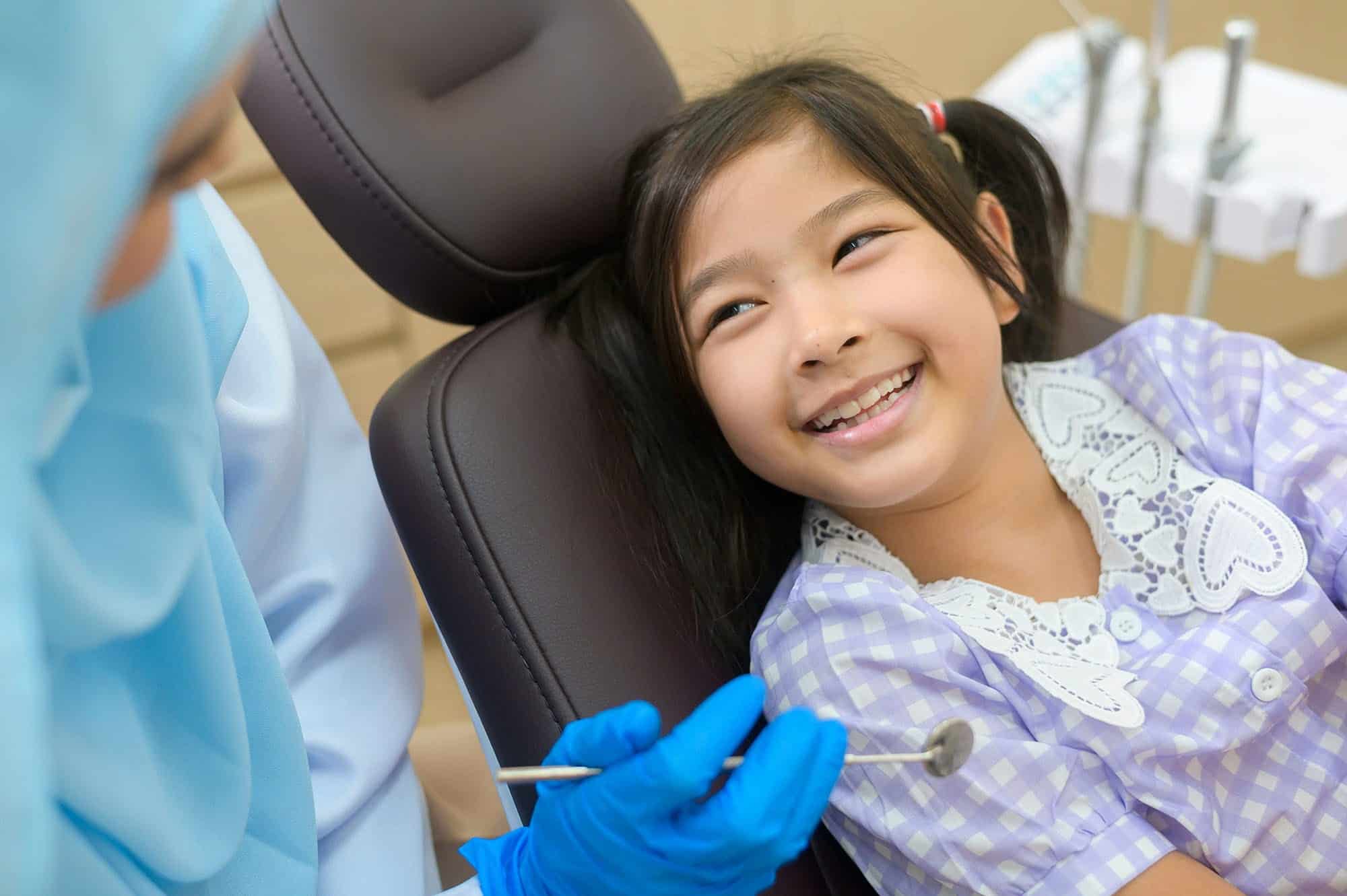 Smiling toddler after kids toothache relief from an emergency children's dentist in Lexington, SC